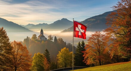 Swiss flag flies beside sacred church on a hill. Golden autumn trees and morning mist fill the serene alpine valley. Symbolizing national tradition, thanksgiving, and communal prayer.