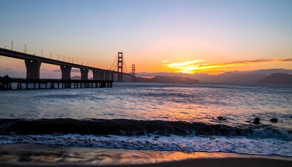 Obraz premium Sunset over bridge and ocean