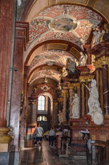 Obraz premium Poland, Poznań July 15, 2024, The Collegiate Basilica of Our Lady of Perpetual Help, St. Mary Magdalene and St. Stanislaus the Bishop in Poznań, also known as the Poznań Parish Church, interior