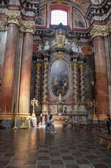 Fototapeta premium Poland, Poznań July 15, 2024, The Collegiate Basilica of Our Lady of Perpetual Help, St. Mary Magdalene and St. Stanislaus the Bishop in Poznań, also known as the Poznań Parish Church, interior