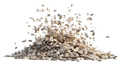 A pile of sunflower seeds erupts in a burst