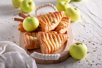 Delicious apple triangle cake made of cinnamon, fruits and milk.
