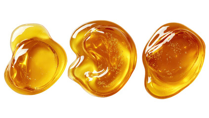 Three golden, glossy drops