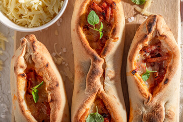 Homemade fruste Margherita made of cheese and tomatoes.