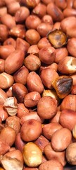 Obraz premium Roasted peanuts fo the background