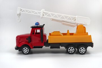 Naklejka premium Side View of Toy Crane Truck with Retracted Boom