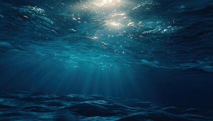 Fototapeta premium Underwater scene, sunbeams illuminating the deep blue ocean