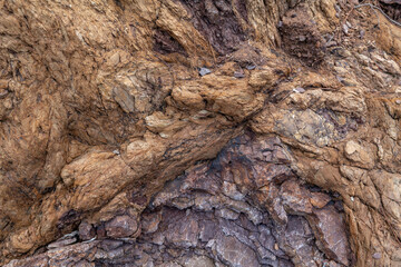 Chert / sedimentary rock. commonly with thin interlayers of reddish-brown shale, graywacke and greenstone. Coyote Point Beach, San Mateo, California. San Francisco Peninsula. San Francisco Bay