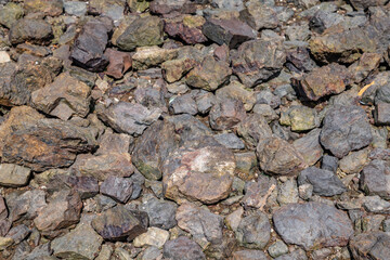 Chert / sedimentary rock. commonly with thin interlayers of reddish-brown shale, graywacke and greenstone. Coyote Point Beach, San Mateo, California. San Francisco Peninsula. San Francisco Bay