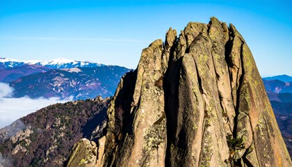 Mountain peak, rugged cliffs, panoramic view