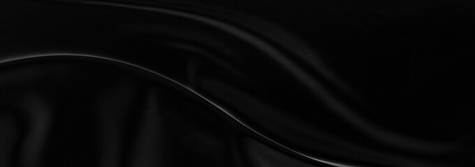 Obraz premium Black gray satin dark fabric texture luxurious shiny that is abstract silk cloth panorama background with patterns soft waves blur beautiful.