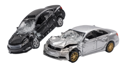 Two toy cars in a collision, showing damage