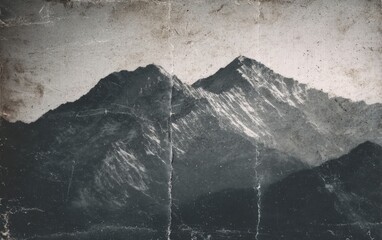 Aged photo of mountains, textured paper