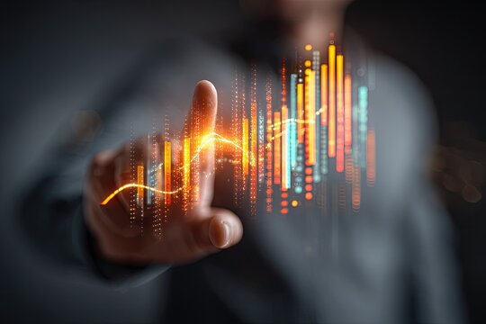 A hand touches a holographic chart of financial data