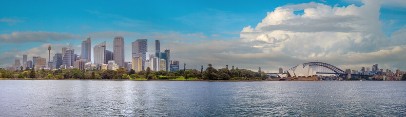 Fototapeta premium Sydney skyline panorama from the Royal Botanic Garden water front, New South Wales, Australia