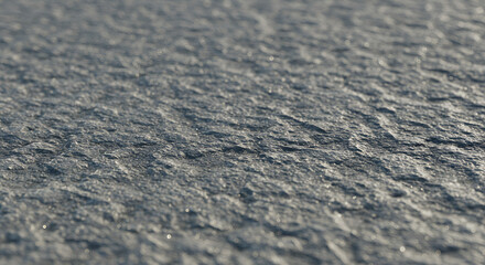 Detailed texture of a slate surface showing rugged and weathered patterns
