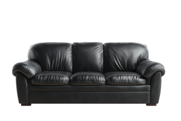 Black leather sofa against dark background