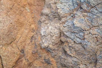 Greenstone / Metamorphic rock. Weathered. Dark-green to red, altered basaltic volcanic rocks. altered to clay minerals.Coyote Point Beach, San Mateo, California. San Francisco Peninsula / Bay