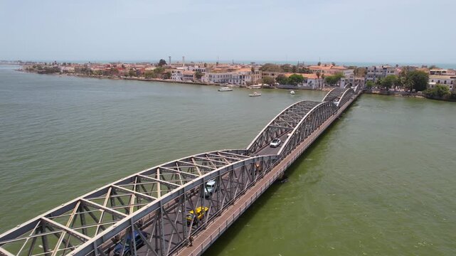 SENEGAL - 7.16.2025 - Great aerial footage moving along the Faidherbe Bridge on Senegal's Island of Saint-Louis.