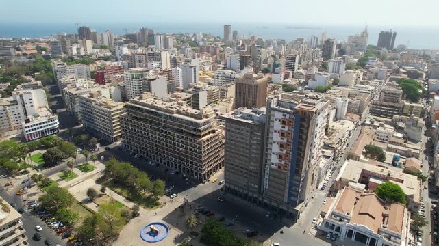 SENEGAL - 7.14.2025 - Good aerial footage approaching downtown buildings in the coastal city of Dakar, Senegal.