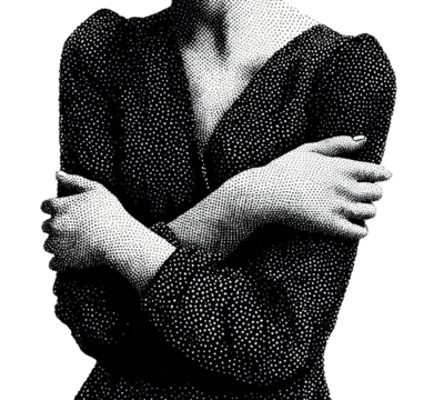 Woman in a textured black and white dress, arms crossed