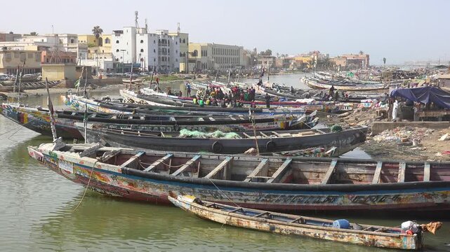 SENEGAL - 7.16.2025 - Many boats are docked in a harbor on Senegal's Island of Saint-Louis.