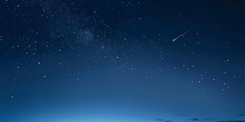 Shooting star across starry night sky above dark landscape
