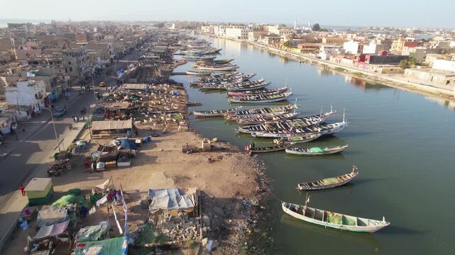 SENEGAL - 7.16.2025 - Fantastic aerial footage moving up a packed harbor on Senegal's Island of Saint-Louis.