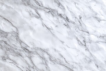 Close-up view of a white marble surface with gray veins
