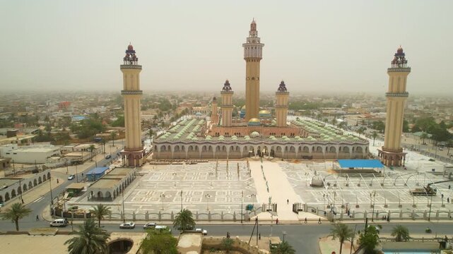 SENEGAL - 7.21.2025 - Amazing aerial footage circling clockwise around Senegal's Great Mosque Of Touba.