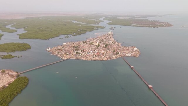 SENEGAL - 7.31.2025 - Amazing aerial footage moving in on the island of Joal-Fadiouth, Senegal.