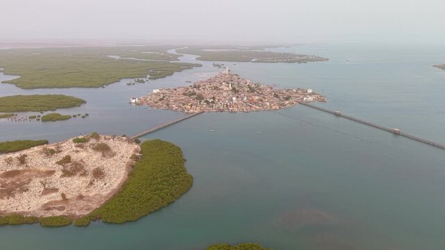 SENEGAL - 7.31.2025 - Good aerial footage approaching Joal-Fadiouth, Senegal from another island.