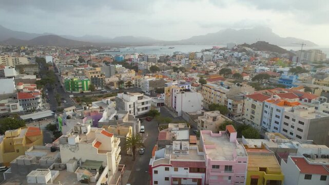 CAPE VERDE - 8.20.2025 - Beautiful aerial footage moving towards the coast in the city of Mindelo on Sao Vicente, Cape Verde.