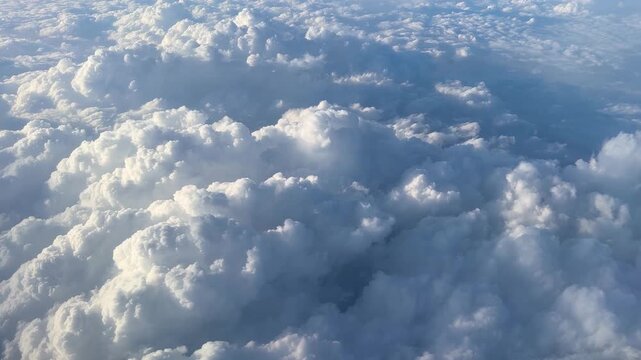 CAPE VERDE - 8.20.2025 - Gorgeous aerial view of the clouds over Cape Verde taken from the plane.