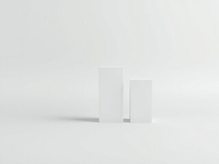 Clean minimalist product display with two white boxes and a pen