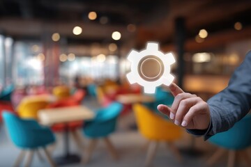 Hand touching a white gear icon over a blurred cafe background