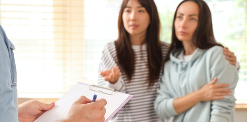 Psychoanalyst and young people at group therapy session