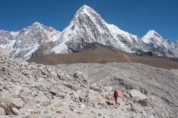 Toruist while walking to Everest base camp with beautiful view of Mt.Pumori (7,165 m) with other...