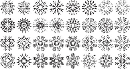 Fototapeta premium Collection of intricate black and white snowflake designs for winter decoration