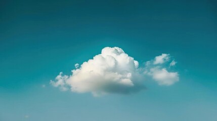 Fresh and Light Summer Vibe: Fluffy White Clouds Over Clear Blue Sky on Sunny Day