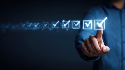A man in a blue shirt is touching a virtual checkmark icon on a dark background.