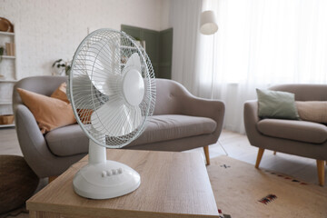 Electric fan on table in living room