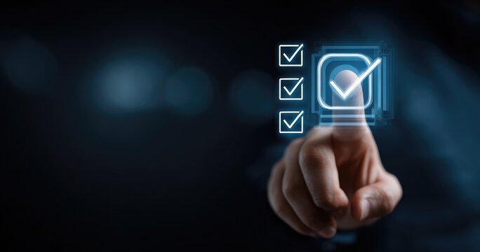 Hand touches digital checklist on dark background