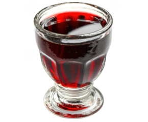A clear glass filled with dark red liquid isolated on transparent background