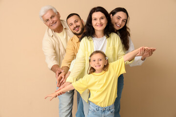 Obraz premium Portrait of big family on beige background