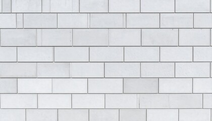 Naklejka premium White rectangular tiles form a seamless wall