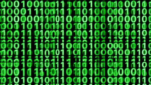 Digital Code Binary Data Stream Flowing Across a Screen