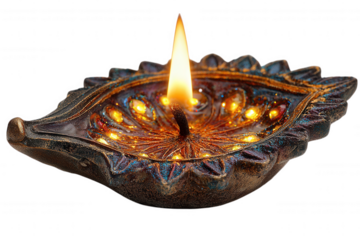 Ornate decorative oil lamp with glowing flame isolated on transparent background