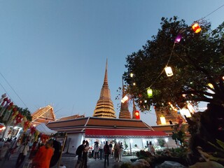 Electric lighting decoration for celebrate in Wat pho temple under evening sky