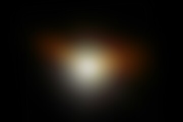 Abstract Warm Light Glow on Black Background, Soft Golden Spotlight Blur in Darkness, Radiant Centered Light with Brown Gradient